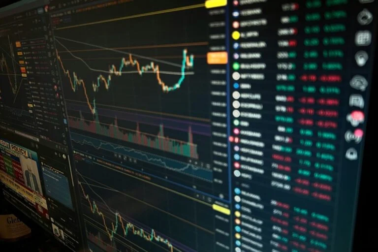 Tiny Ltd Graduates To The Toronto Stock Exchange — What The Tsx Move Means For Canadian Investors Stock market trading screens showing charts and tickers as Tiny Ltd graduates to the Toronto Stock Exchange
