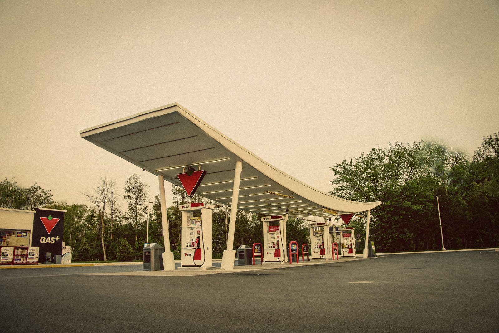 Alberta Fuel Tax Cut 2026 — Smith Axes The 13-Cent Levy Oct. 1 As A $9.4B Deficit Flips To A $2B Surplus 2 A Canadian gas station in Canada — Alberta drivers will pay 13 cents less per litre under the Alberta Fuel Tax suspension