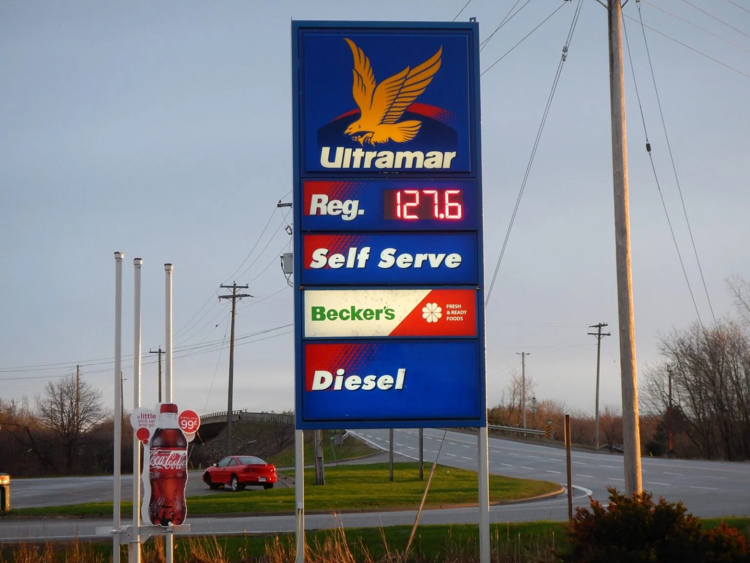 Alberta Fuel Tax Cut 2026 — Smith Axes The 13-Cent Levy Oct. 1 As A $9.4B Deficit Flips To A $2B Surplus A Canadian gas station price tower — the Alberta Fuel Tax cut removes 13 cents a litre from Oct. 1 to Dec. 31, 2026