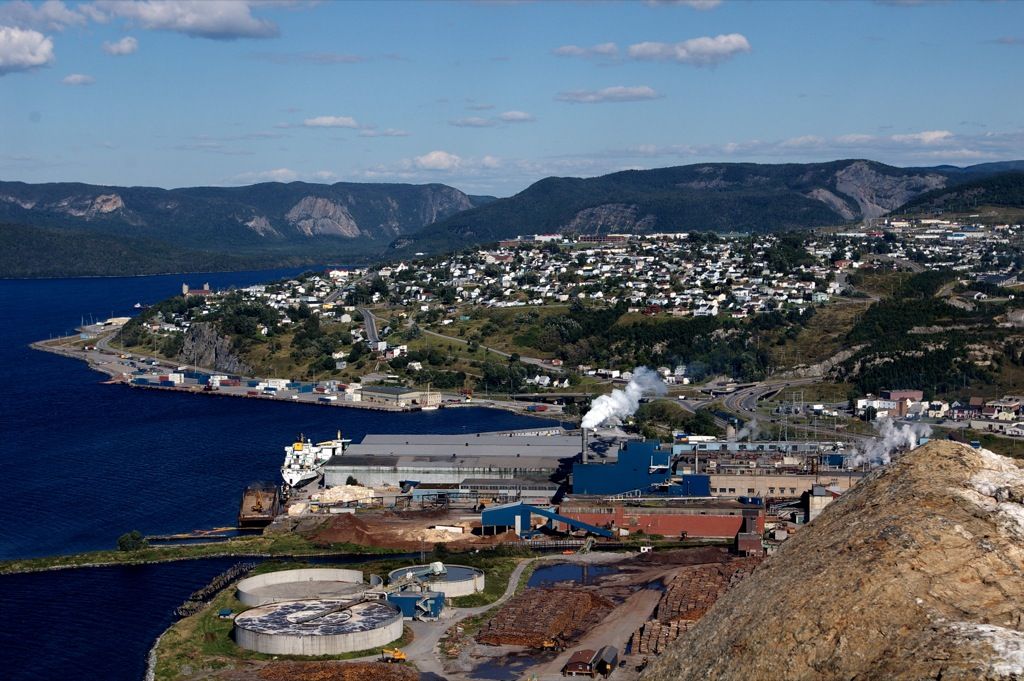 Corner Brook Health Investment 2026 — 45 New Long-Term Care Beds And Addictions Expansion 1 Corner Brook from above, showing the harbour and pulp mill