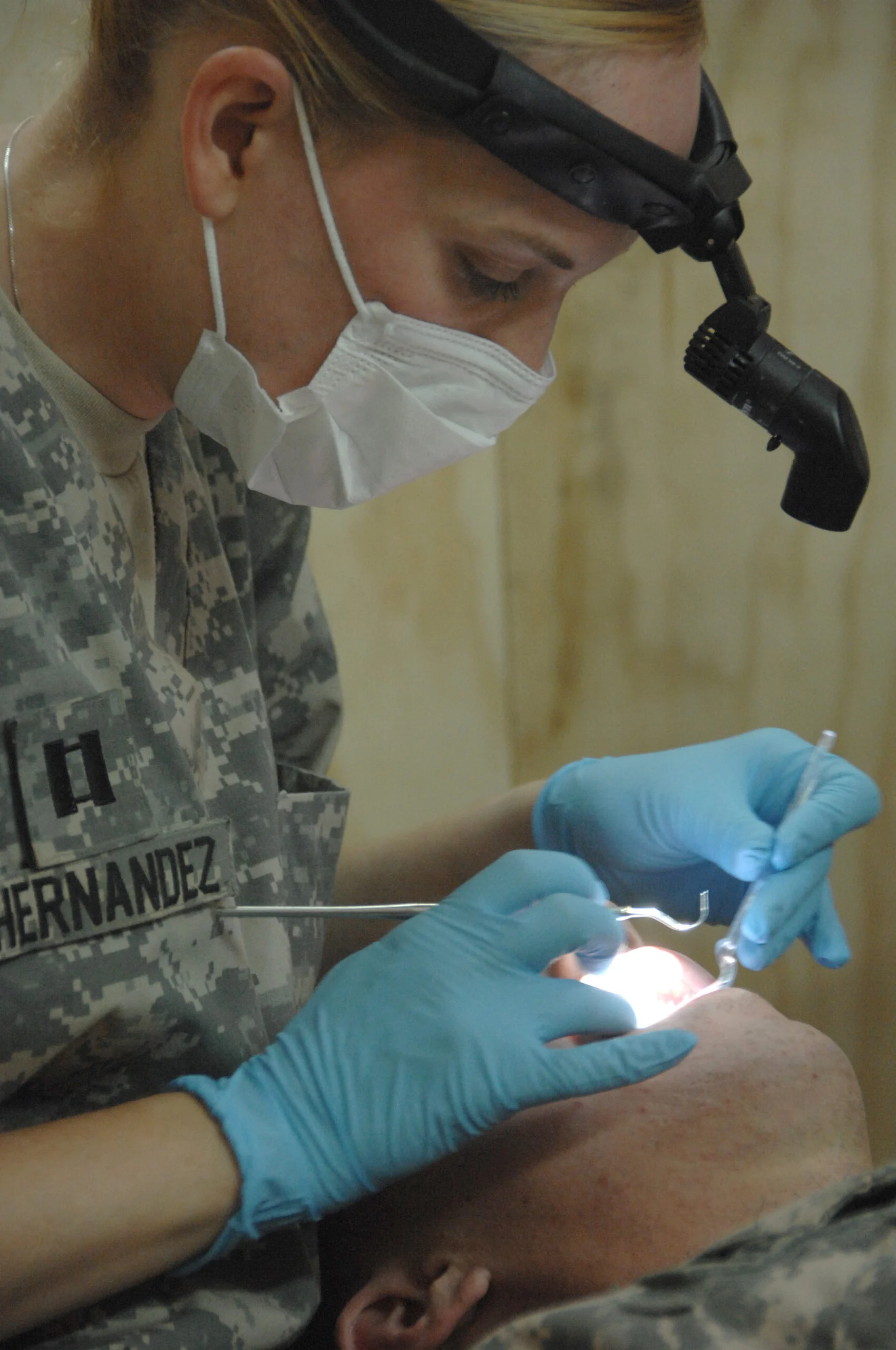 Canada Dental Care Plan 2026 — Manitoba'S September 1 Rule Change And Who'S Covered Now 3 A dentist performing a checkup on a patient, illustrating covered dental services under the Canada Dental Care Plan