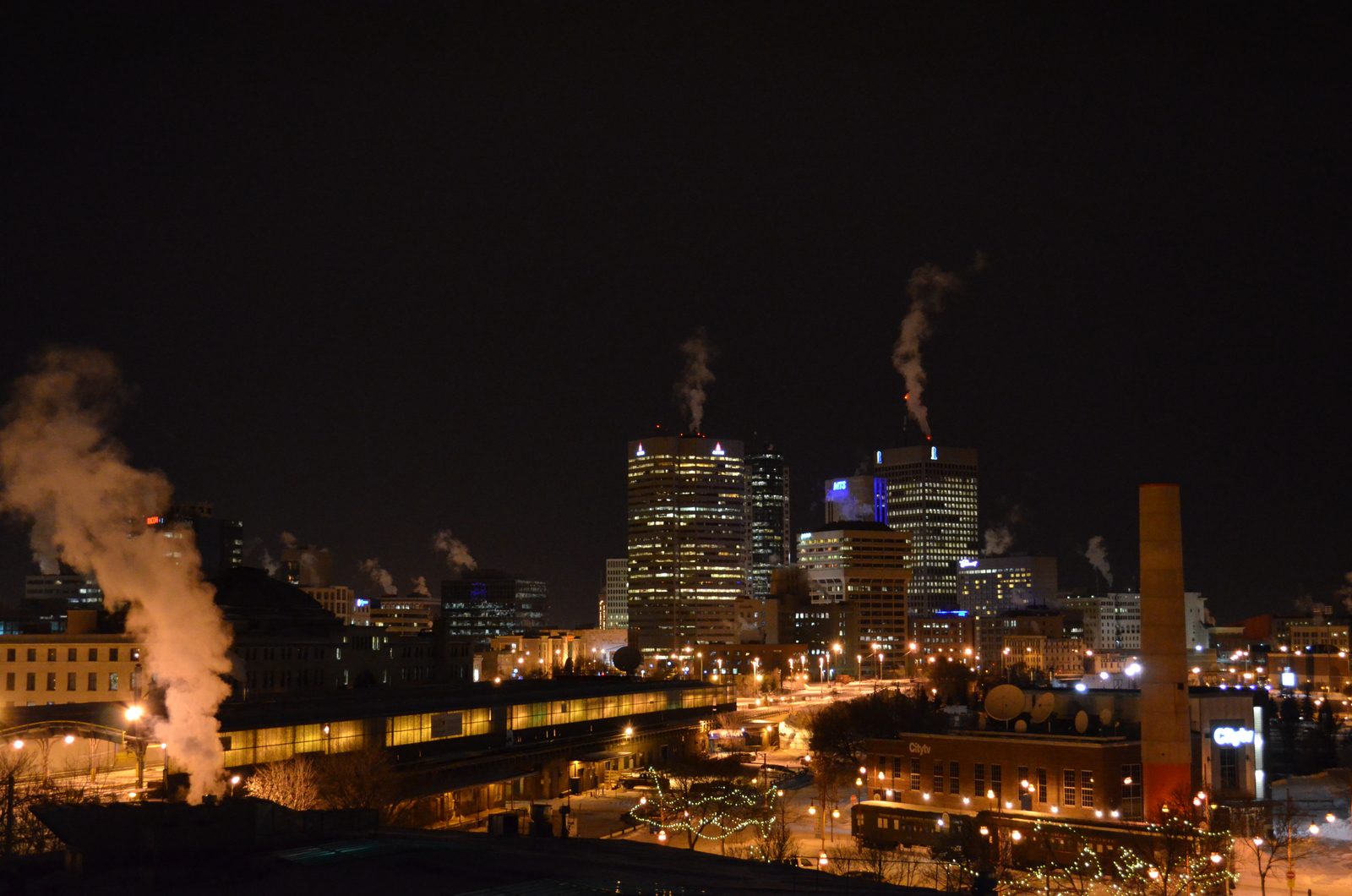 Manitoba Daylight Saving Time 2026 — No More Clock Changes Starting This Fall 2 Manitoba Daylight Saving Time — downtown Winnipeg skyline at night