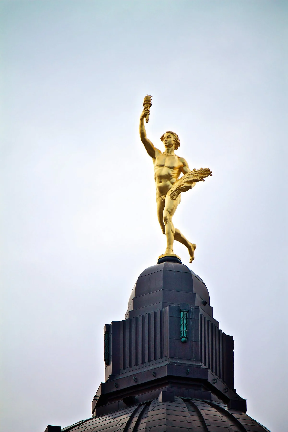 Manitoba Pays $250K Each To Two Men Switched At Birth In 1955 2 Golden Boy statue atop the Manitoba Legislative Building in Winnipeg