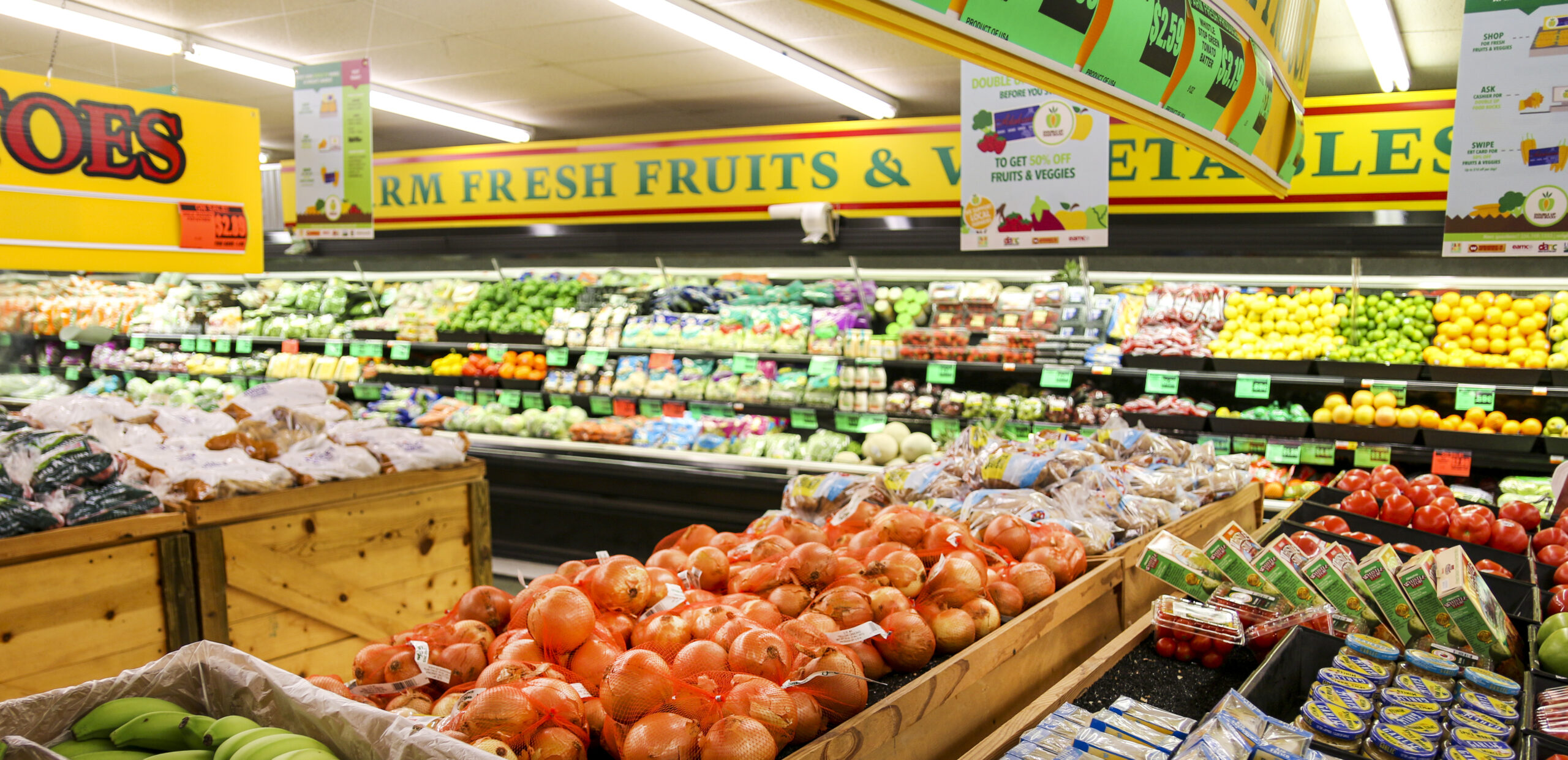 Canada Grocery Prices 2026 — What'S Getting Cheaper, What'S Still Hurting, And Why Your Bill Isn'T Falling 1 Canada Grocery Prices 2026: produce section of a grocery store