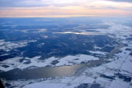 Canadian Cottage Culture 2026 — Fall Cabin Season Brings Lower Prices, Quieter Lakes And Real Etiquette Lessons Aerial view of Lac du Bonnet, Manitoba — Canadian Cottage Culture 2026 in Manitoba lake country