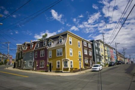 Newfoundland and Labrador Home Repair Program: colourful row houses (Jellybean Row) on a street corner in St. John's, Newfoundland
