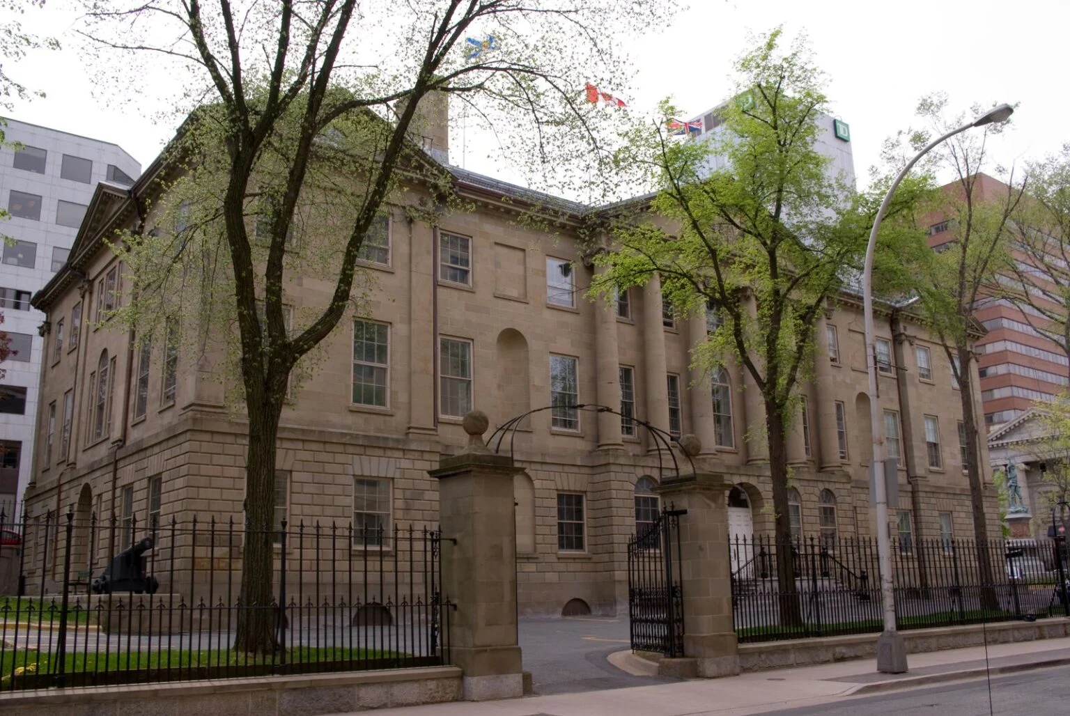 Nova Scotia Record Deficit 2026 — $1.4 Billion Shortfall, Largest In Provincial History Province House in Halifax, seat of the legislature facing the Nova Scotia Record Deficit.
