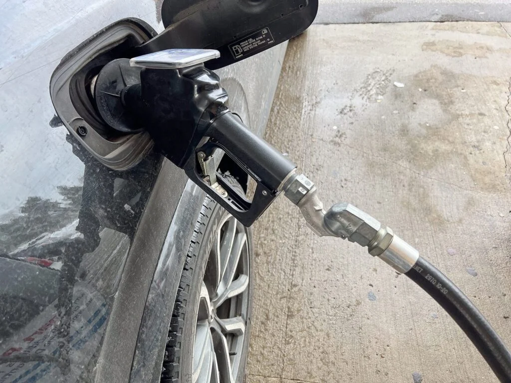 P.e.i. Fuel Tax Suspension — Rob Lantz Scraps Provincial Fuel Tax Until January 2027 Car refuelling at a gas pump as the P.E.I. Fuel Tax Suspension takes effect