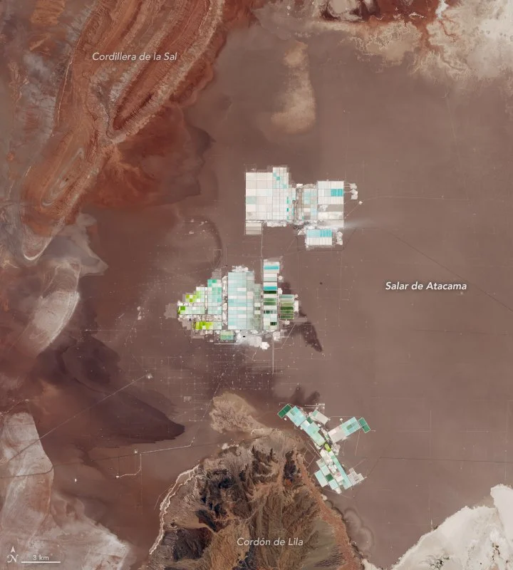 Prairie Lithium 2026 — C$6.3M Interest-Free Federal Financing Fuels Saskatchewan Lithium Build 1 Satellite view of lithium brine evaporation ponds like those planned by Prairie Lithium in Saskatchewan