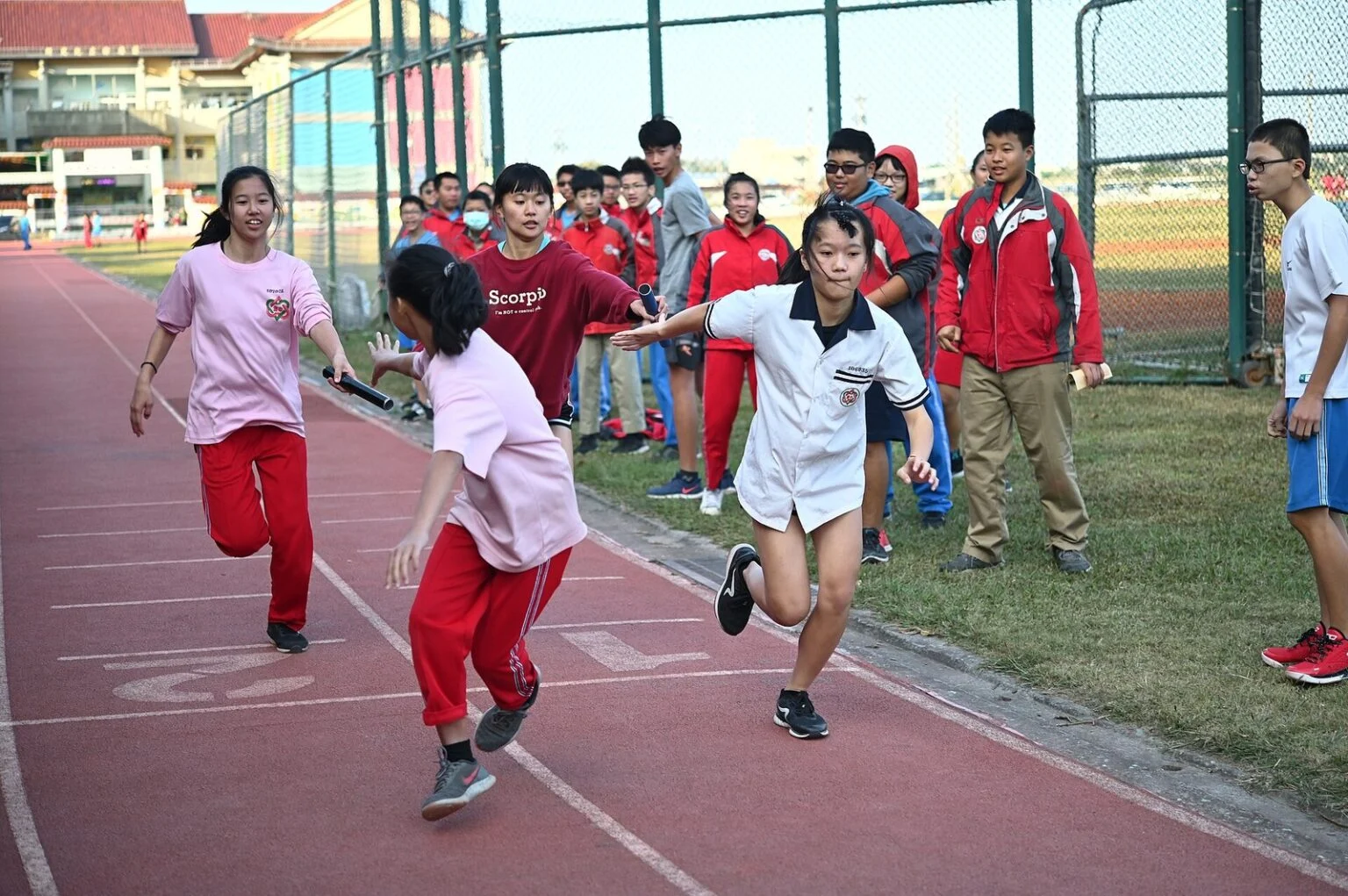 Premier’S Fitness Challenge Manitoba 2026 — Wab Kinew Challenges Every Student To Get Faster, Stronger And Moving Every Day Premier's Fitness Challenge Manitoba: junior high students sprinting a relay race on an outdoor running track