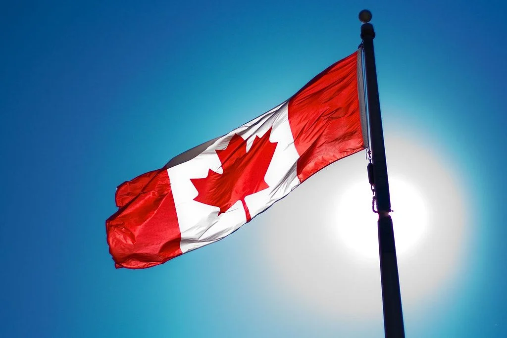 Canada Is Fast-Tracking 33,000 Temporary Workers To Permanent Residence — Are You One Of Them? Canadian flag