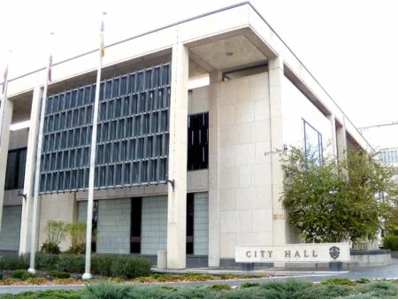 Winnipeg Launches Fourth 911 Option: Community Crisis Response Model For Mental Health Calls Approved Winnipeg City Hall building exterior, where council adopted the Fourth 911 Option
