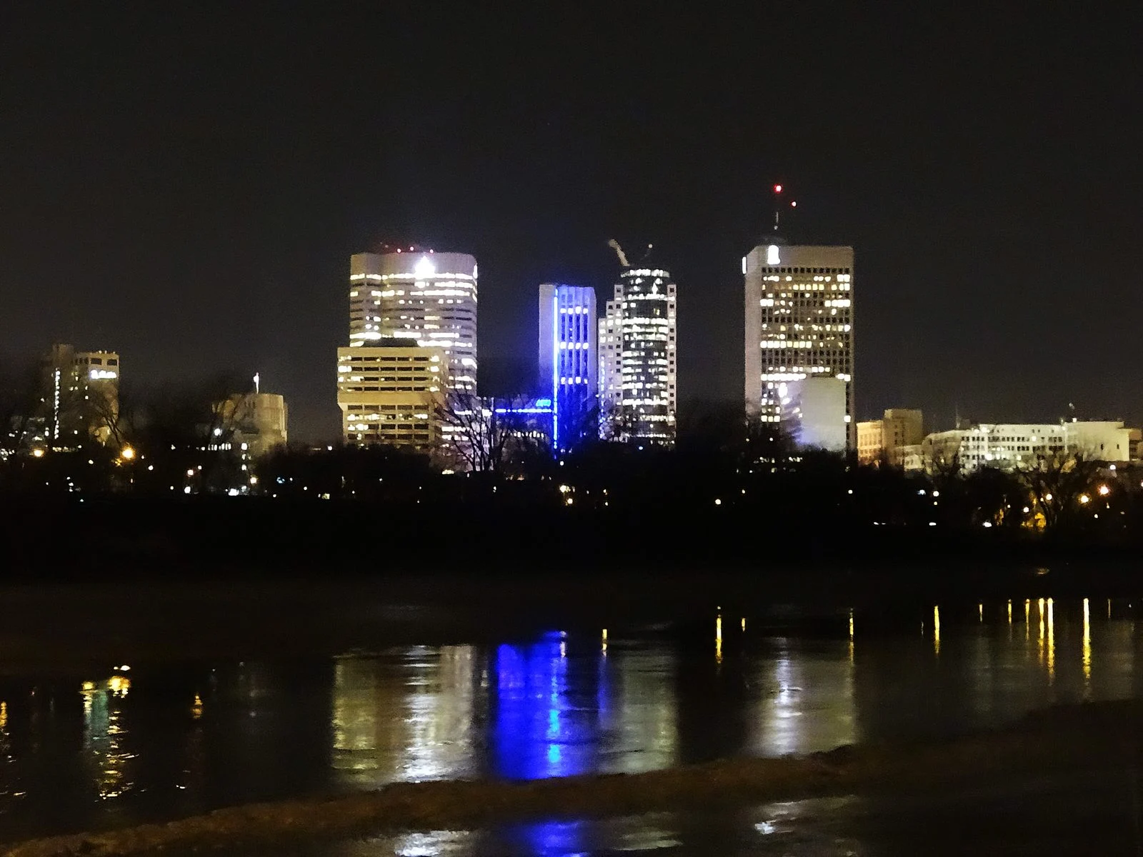 Grifols Winnipeg Plasma 2026 — Health Canada Suspends Licence After Two Donor Deaths 2 Winnipeg skyline at night — the city where the Grifols Winnipeg Plasma licence was suspended