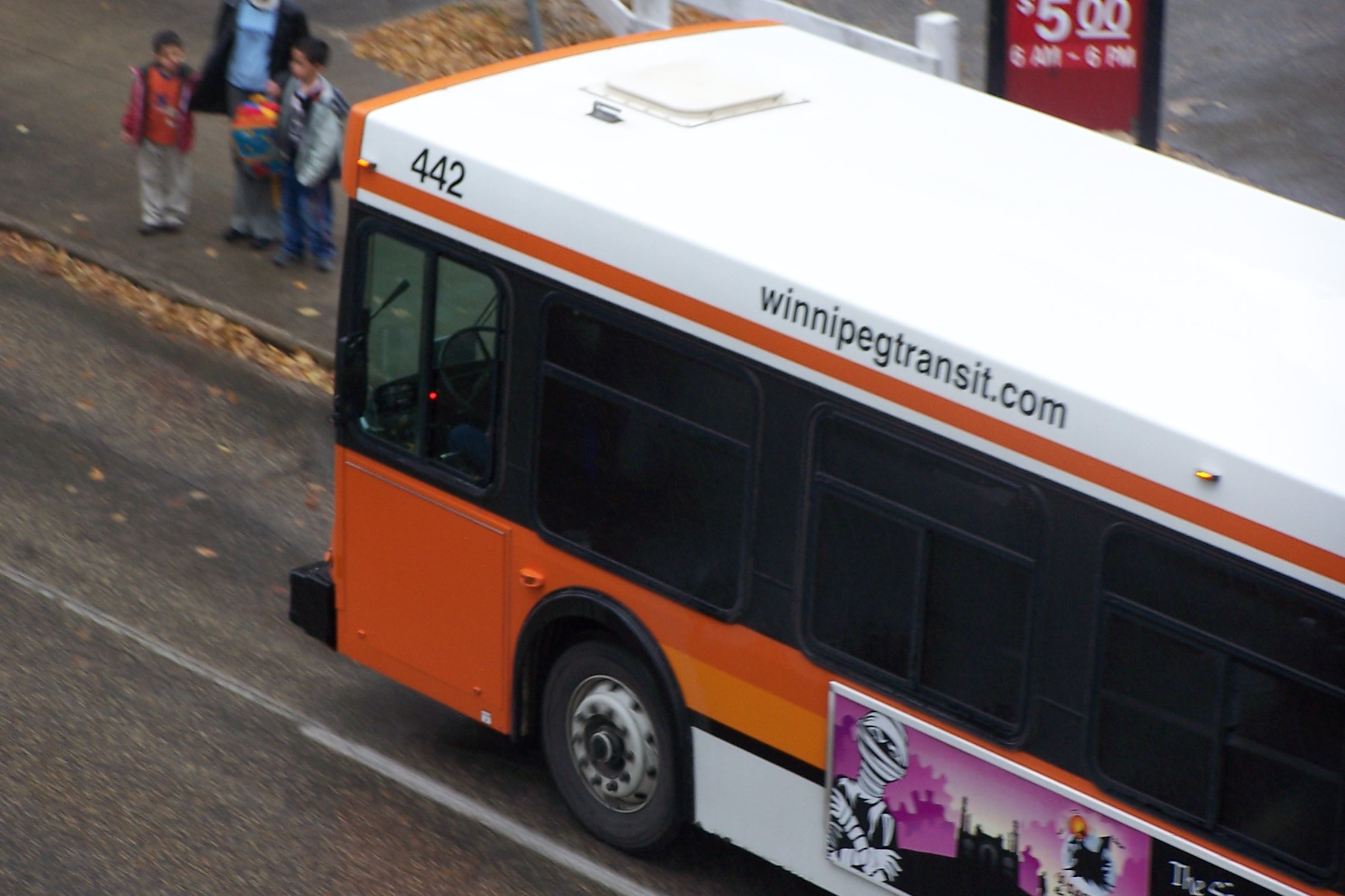 Cost Of Living In Winnipeg 2026 — What $3,000 A Month Actually Gets You In Canada'S Most Affordable Big City 2 A Winnipeg Transit bus — monthly pass $119.35 in 2026
