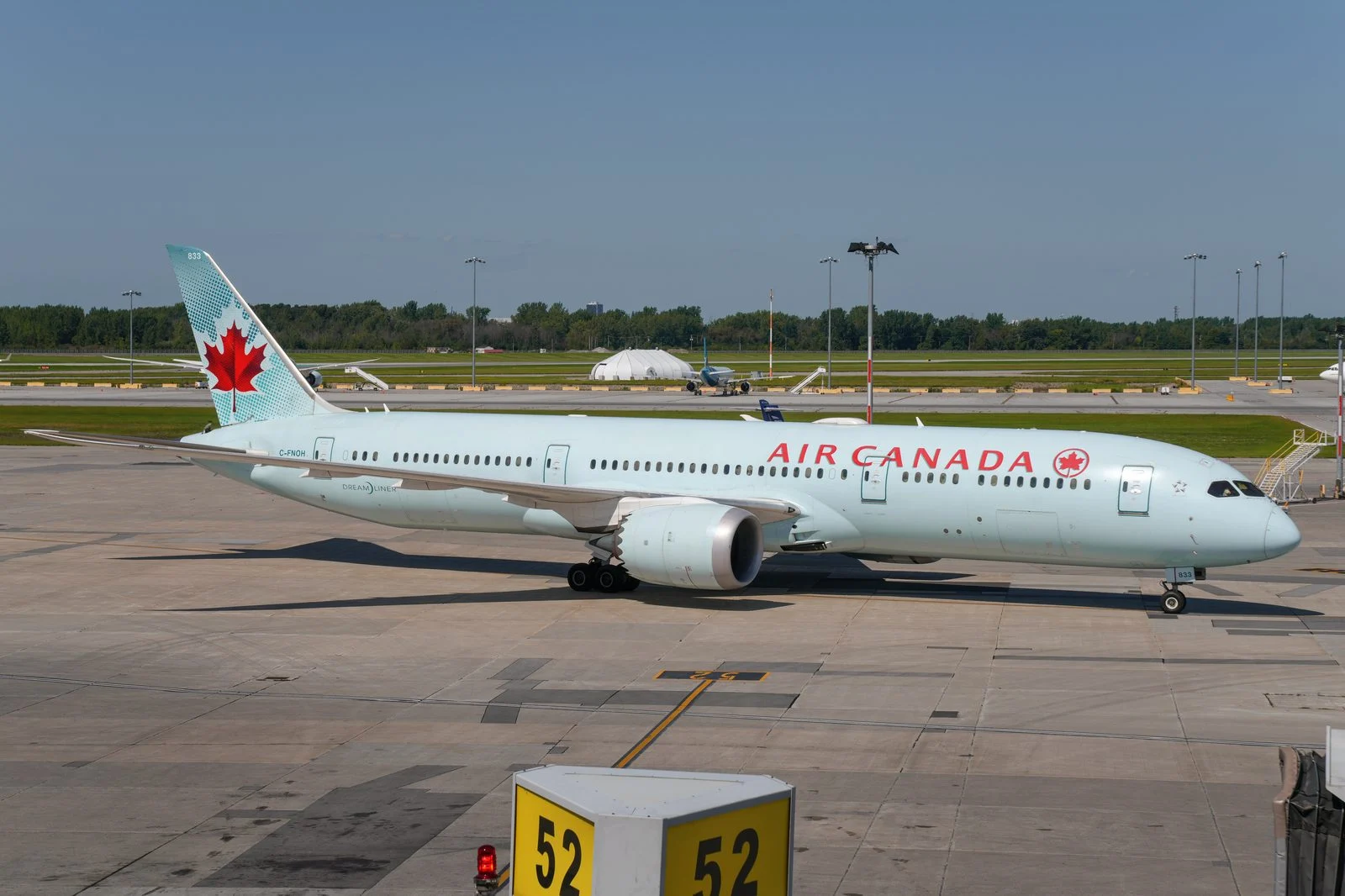 Air Canada Montreal Delhi 2026 — Winter Schedule Trimmed, Delhi Route Ends A Month Early 2 Air Canada Boeing 787-9 Dreamliner on the tarmac at Montréal-Trudeau — Air Canada Montreal Delhi flight AC50 departs at 10:05 p.m.