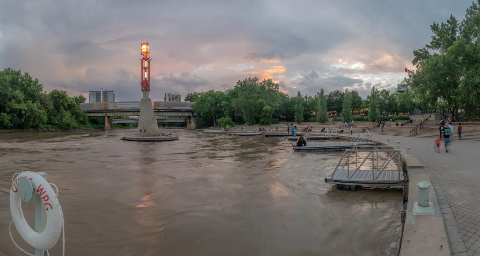 Alaya Mcivor Memorial Walk 2026 — Winnipeg Honours Mmiwg2S+ Advocate Alaya McIvor Memorial Walk 2026 — The Forks, Winnipeg at dusk, starting point of the memorial march