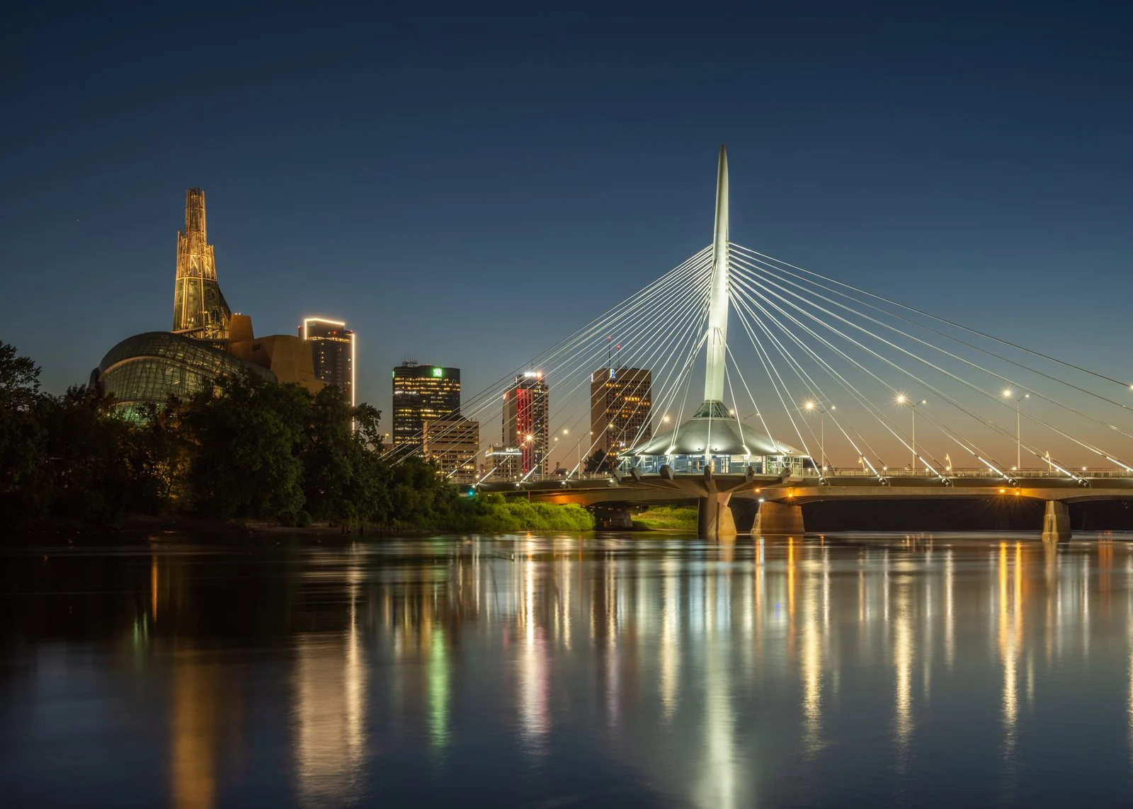 Alaya Mcivor Memorial Walk 2026 — Winnipeg Honours Mmiwg2S+ Advocate 3 Esplanade Riel Bridge at dusk over the Red River in Winnipeg, Manitoba