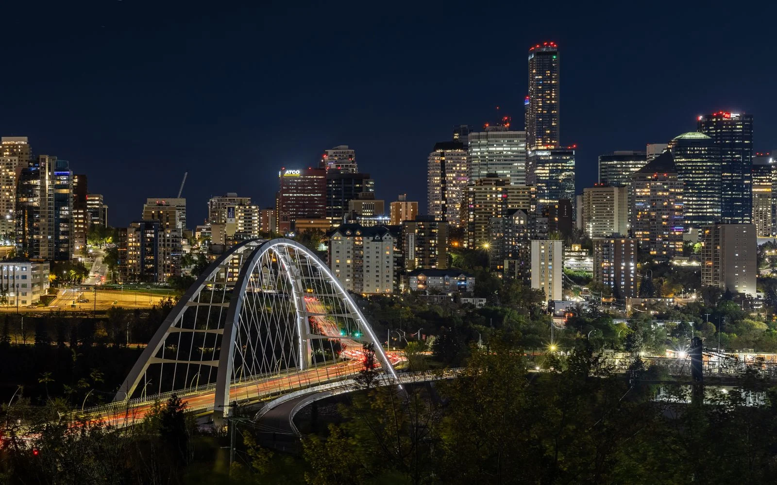 Alberta Immigration Referendum 2026 — Former Premiers Stelmach, Redford And Notley Unite To Urge 'No' On Ballot Questions 2 Walterdale Bridge and downtown Edmonton at night — Alberta's population grew by roughly 600,000 from 2021 to 2026, two-thirds from international migration
