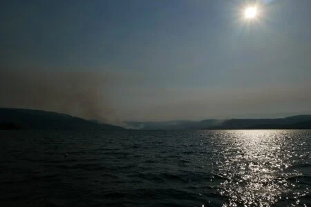 B.c. Election 2026 — Doerkson’S $500M Water-Bomber Fleet Meets Eby’S Grocery Price Guards In The Okanagan Wildfire smoke rising over the Okanagan as the B.C. Election 2026 campaign promises a water-bomber fleet