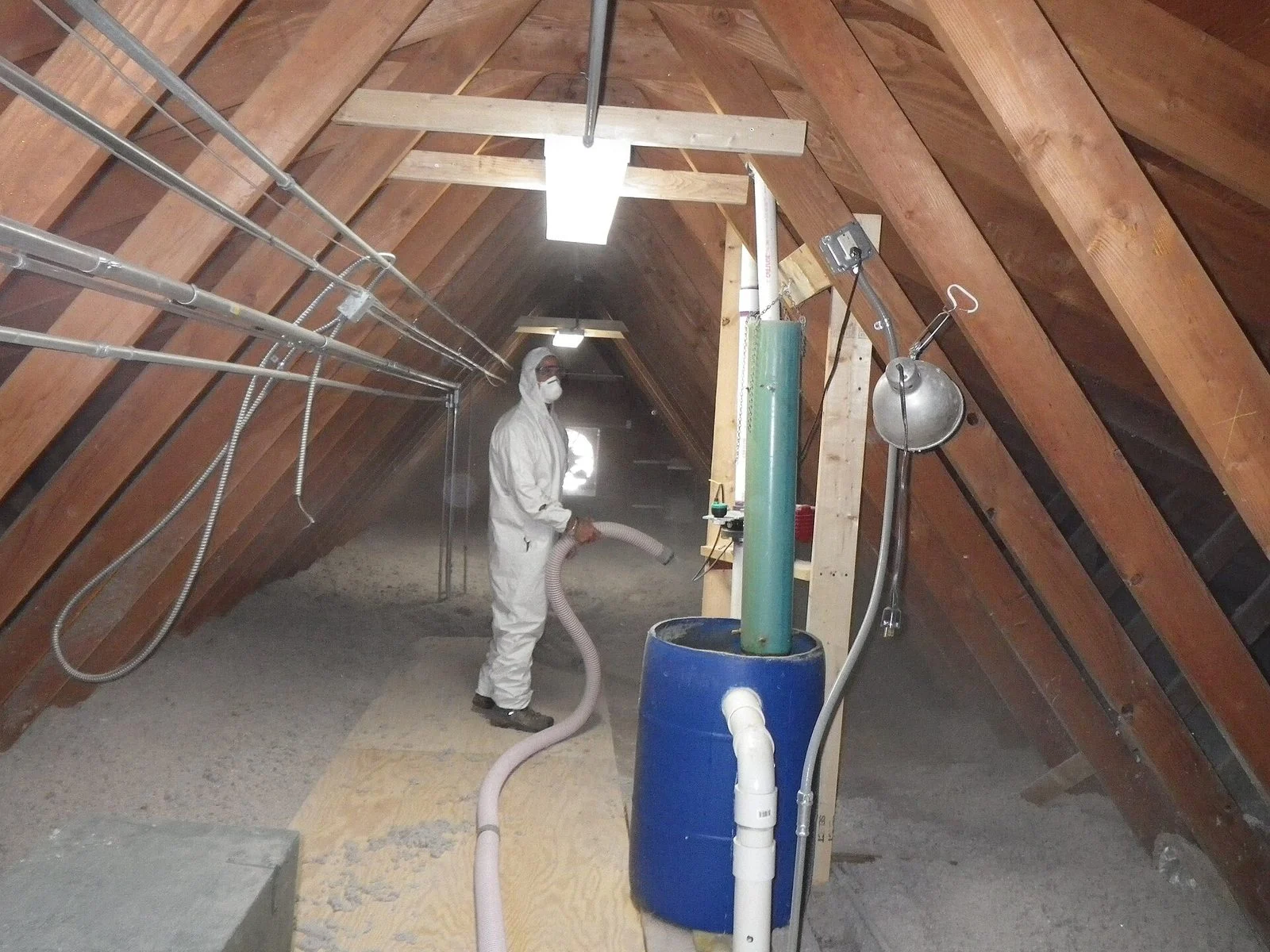 Canada Home Energy Retrofit Funding 2026 — $66.3M For 162 Projects Announced In Ajax 2 Worker installing blown insulation in a home attic