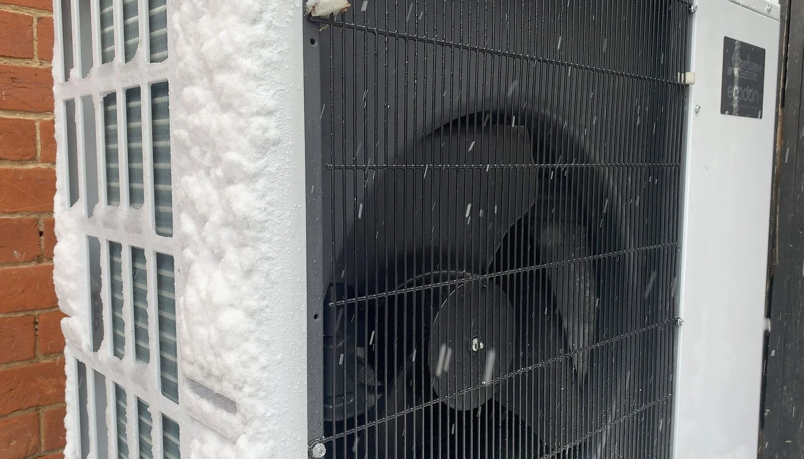 Canada Home Energy Retrofit Funding 2026 — $66.3M For 162 Projects Announced In Ajax 3 An outdoor heat pump unit running in snow