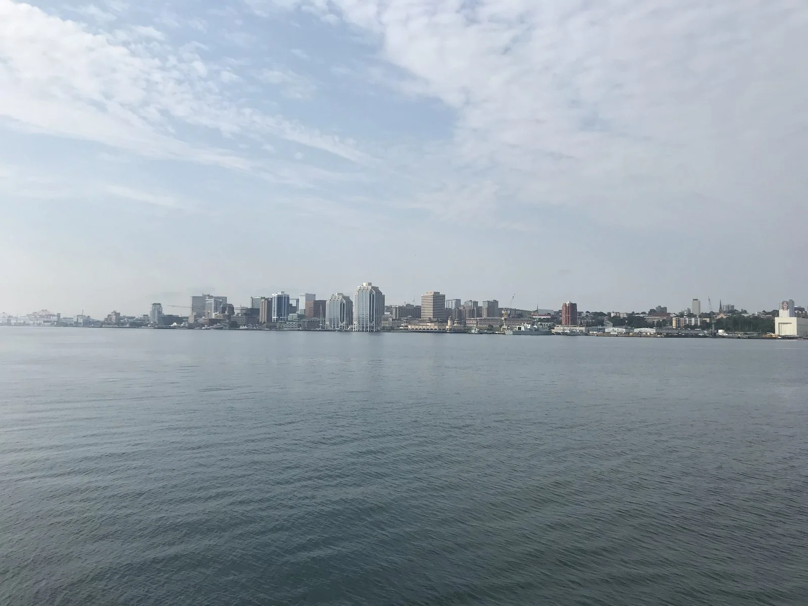 Emera-Atco Merger 2026 — $72-Billion Deal Is The Biggest In Canadian History 2 Halifax skyline across the harbour, where the merged Emera company will keep its public company headquarters
