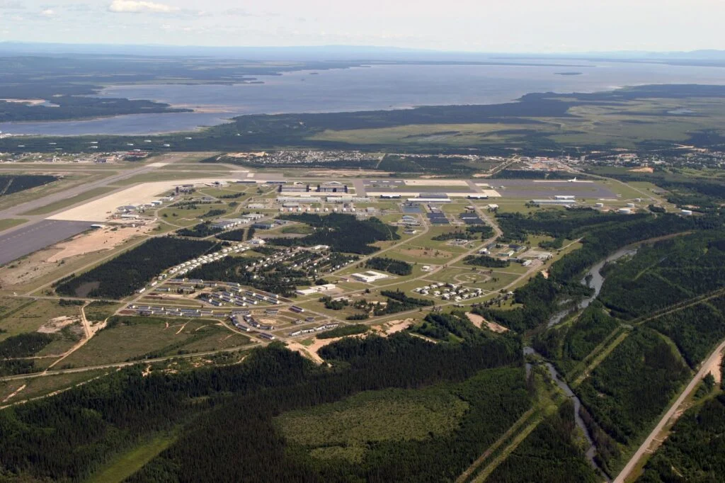 5 Wing Goose Bay Heating Plant 2026 — $187M To Move The Base Off Diesel Aerial view of 5 Wing Goose Bay in Happy Valley-Goose Bay, Labrador, where the new 5 Wing Goose Bay Heating Plant will be built