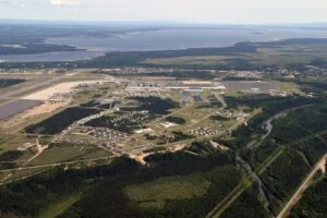 5 Wing Goose Bay Heating Plant 2026 — $187M To Move The Base Off Diesel Aerial view of 5 Wing Goose Bay in Happy Valley-Goose Bay, Labrador, where the new 5 Wing Goose Bay Heating Plant will be built
