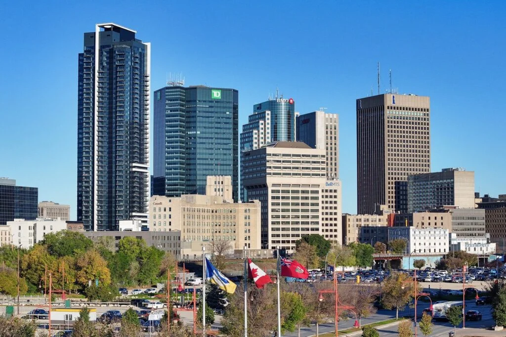 Grifols Winnipeg Plasma Centre Reopens 2026: Two Months After The Shutdown That Shocked Donors Grifols Winnipeg Plasma: downtown Winnipeg skyline in daylight