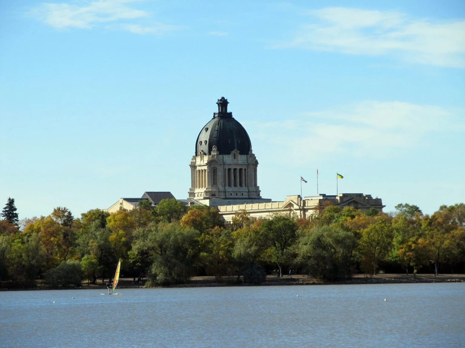 Ken Krawetz Dies 2026 — Saskatchewan Party Co-Founder Remembered At 75 Saskatchewan Legislative Building in Regina, where flags were lowered to half-mast after Ken Krawetz died at 75