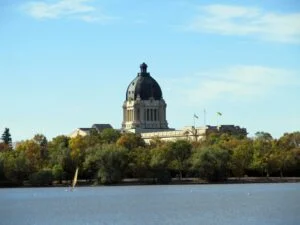 Ken Krawetz Dies 2026 — Saskatchewan Party Co-Founder Remembered At 75 Saskatchewan Legislative Building in Regina, where flags were lowered to half-mast after Ken Krawetz died at 75