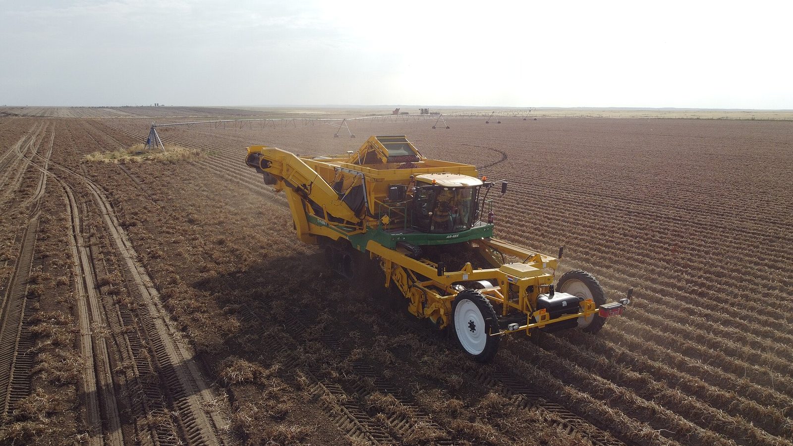 Macdonald Tours Pei Potato Farms 2026 — Minister Spotlights $750M Food-Security Push 3 Self-propelled potato harvester working a field — automation like that seen on MacDonald Tours PEI Potato Farms