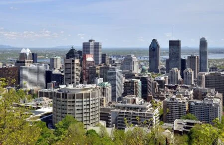 Montreal skyline with downtown skyscrapers, where Montreal HungerCount 2026 reports a record 1.25 million monthly food assistance requests