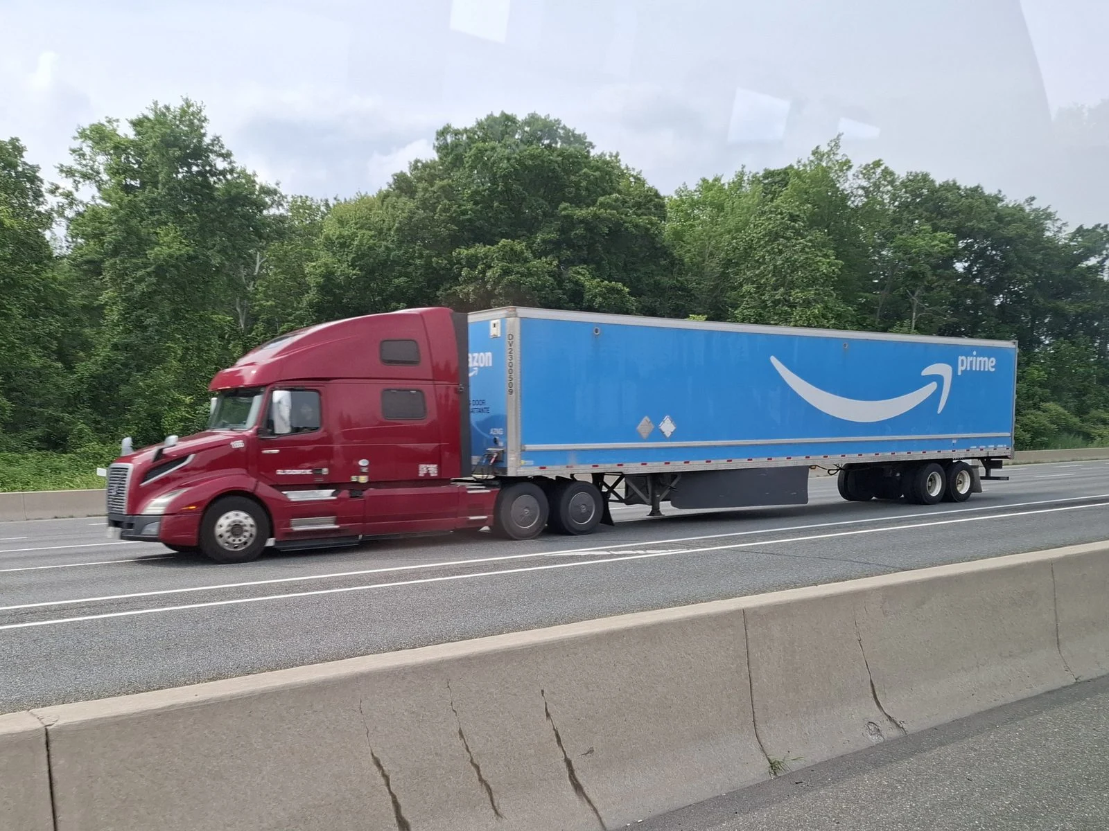 N.b. Diesel Prices 2026 — Soaring Fuel Costs Force Businesses To Add Surcharges 2 Semi-trailer truck on a Canadian highway — trucking industry squeezed by 2026 diesel prices in New Brunswick