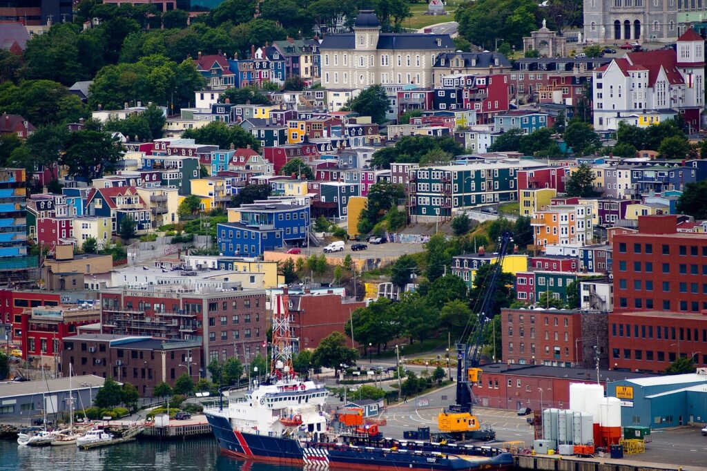 N.l. Water And Wastewater Investment 2026: $23 Million For 10 Projects To Unlock 1,800 Homes N.L. Water and Wastewater story: colourful Jellybean Row houses overlooking St. John's harbour