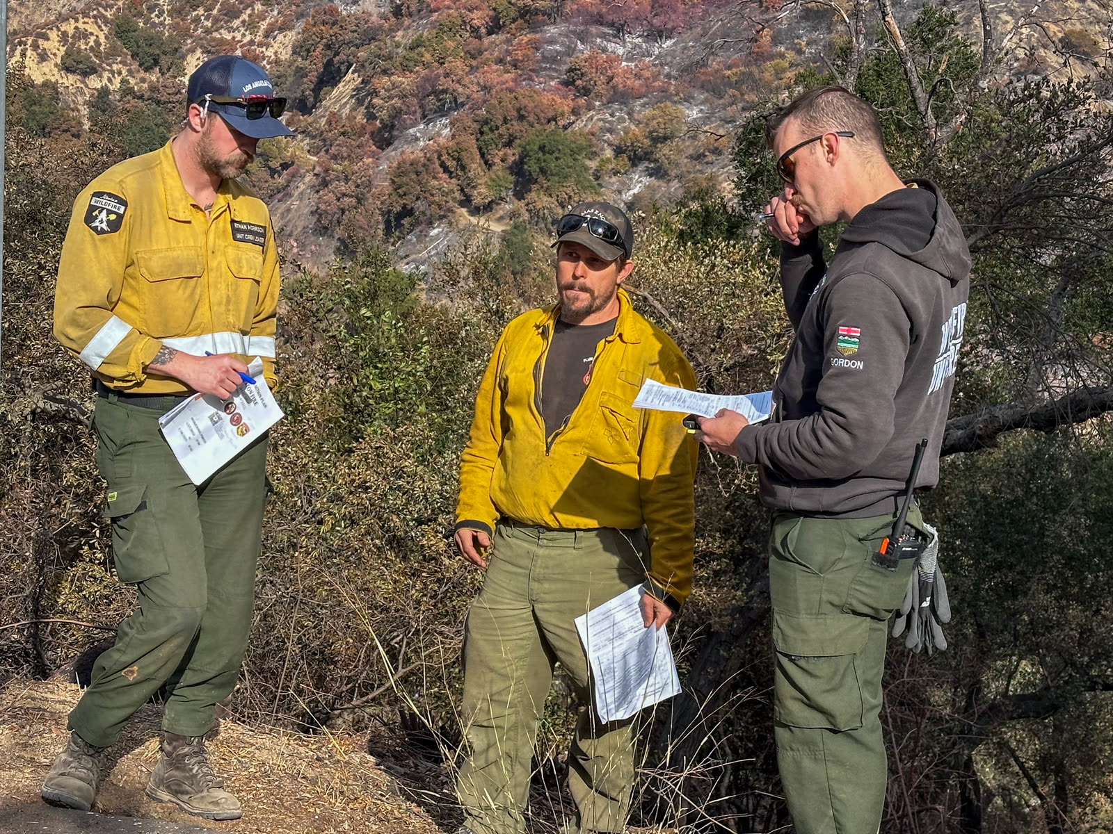 2026 Wildfire Season Nova Scotia: 114 Fires, 1,521 Hectares, A Fraction Of Last Year'S Damage 3 Alberta wildland firefighters receiving their morning briefing and operational assignments before a wildfire shift