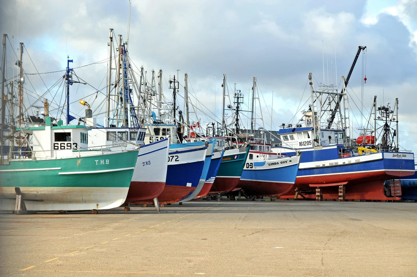 Ottawa Announces Major Construction At Pointe-Verte Harbour In Northern New Brunswick 2 Fishing boats at rest in a New Brunswick harbour near Pointe-Verte harbour
