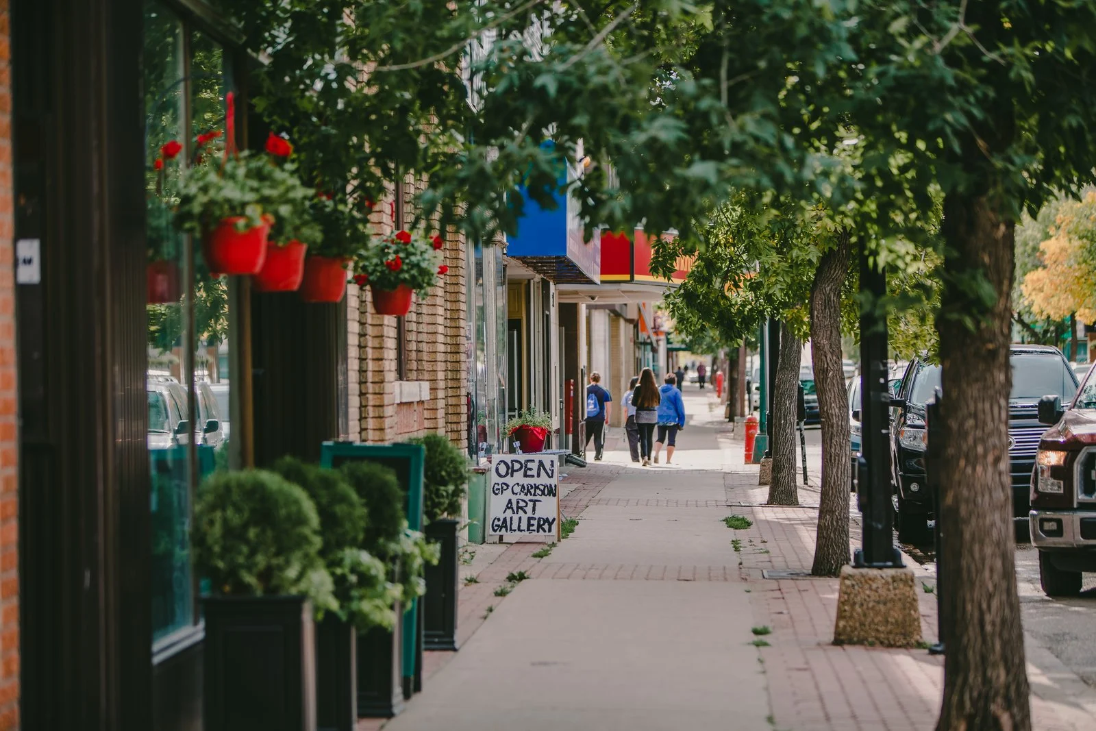 Prince Albert Sober Living Spaces 2026: 12 New Second-Stage Recovery Beds Open With Grand Council 1 Downtown Prince Albert street with shops and trees near the new Sober Living Spaces