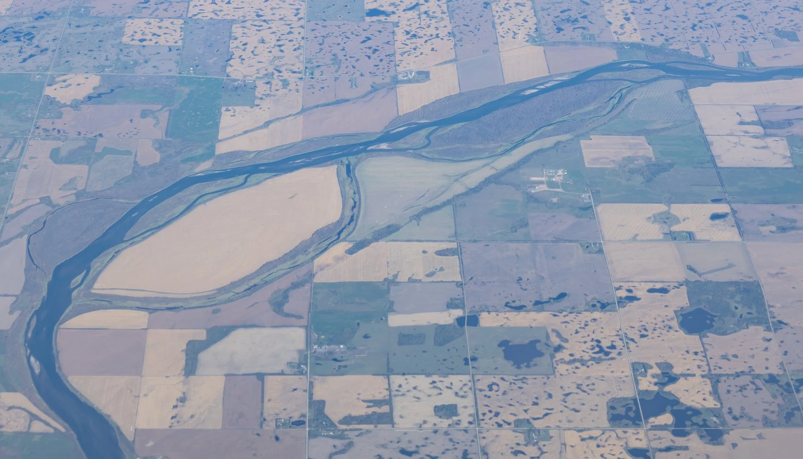 Prince Albert Sober Living Spaces 2026: 12 New Second-Stage Recovery Beds Open With Grand Council 2 Aerial view of the North Saskatchewan River near Prince Albert, Saskatchewan