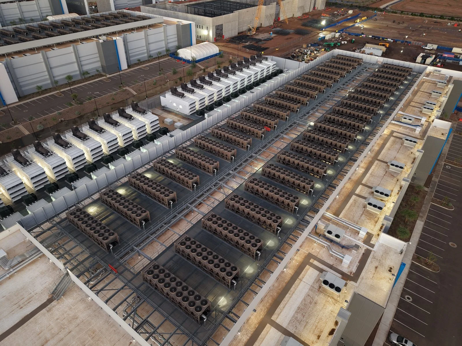 Standing Buffalo Dakota Nation 2026 — 'We Have To Live Here,' Chief Tells Bell Over Regina Ai Data Centre 2 Cooling towers and backup generators on a data centre roof — the Standing Buffalo Dakota Nation wants Bell's environmental and groundwater records