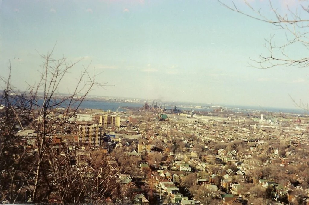 Stelco Layoffs Demand Letter 2026: Hamilton steelworks of Dofasco and Stelco seen from the Niagara Escarpment