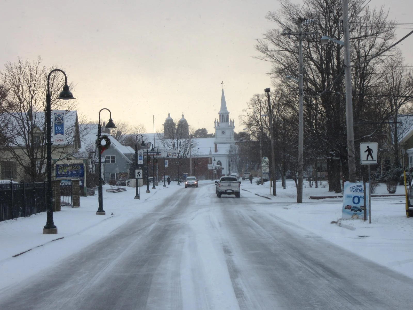 St. Fx Homecoming Sign 2026 — 'Degrading' Sign Condemned By Nova Scotia Universities 2 Main Street in Antigonish, Nova Scotia, near where the St. FX Homecoming Sign was hung off campus