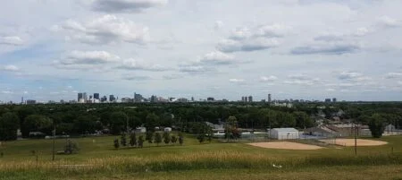 Mike Vogiatzakis 2026 — Mayoral Candidate Says Living Outside Winnipeg “Doesn’T Matter” Downtown Winnipeg skyline — mayoral candidate Mike Vogiatzakis says living outside the city doesn't matter