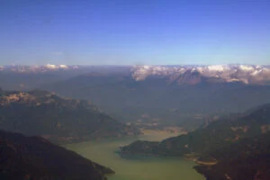 Woodfibre Lng Economic Study 2026 — $11.6 Billion In Government Revenue, Says Deetken Aerial view of Howe Sound and Squamish, British Columbia, home of the Woodfibre LNG Economic Study project site